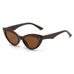 Chic cat-eye sunglasses with brown tinted lenses and silver rivet details on dark frames