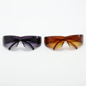 Y2K rimless oversized wrap sunglasses with gradient purple and amber lenses in a sleek design