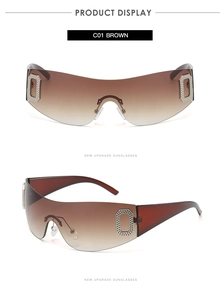 Detail view of brown gradient oversized rimless sunglasses with rhinestone accents