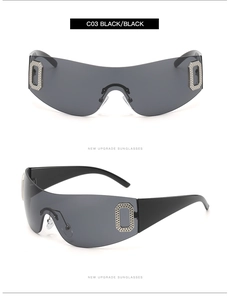 Detail of rimless oversized sunglasses with diamond-set O-shaped metal hinge on black temple