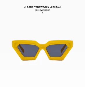 Detailed close-up of yellow cat-eye sunglasses with smoke grey lenses on white background