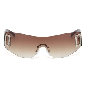 Frameless oversized Y2K sunglasses with brown gradient lenses and rhinestone accents