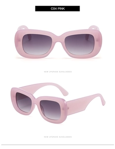 Detail view showing pink translucent square frames and gradient lenses of fashion sunglasses