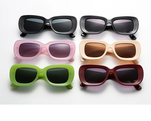 Collection of retro wide-frame sunglasses in various colors on a white background