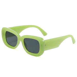 Retro neon green rectangular sunglasses with thick frames and dark lenses for Y2K style