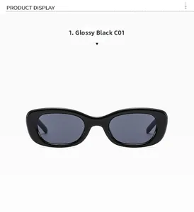 Détail de lunettes de soleil ovales rétro noir brillant avec des verres gris foncé