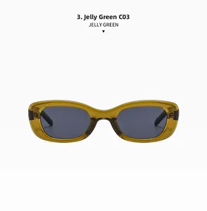 Vue détaillée des lunettes de soleil ovales vert gelée avec monture translucide chic