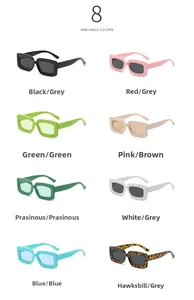 Flat lay display of colorful square sunglasses in black, pink, green, and blue frames