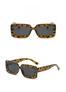 Detailed front and side views of tortoise shell rectangle sunglasses with grey lenses