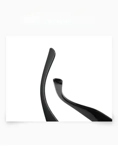 Detail view of the high-gloss black temple on stylish square frame sunglasses