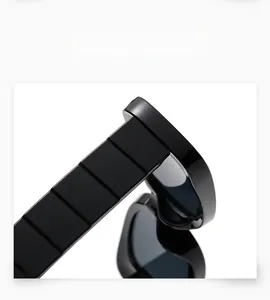Macro view of black square sunglasses frame showing premium segmented temple detail