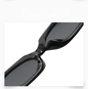 Detail of sturdy nose bridge construction on black square fashionable sunglasses