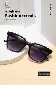 Close-up of square black sunglasses with purple gradient lenses on a display stand