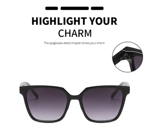 Detail of metal hinge structure on retro square sunglasses with gradient lenses
