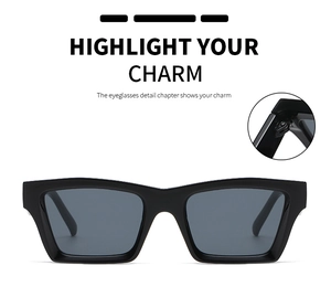 Detailed view of metal hinges and smooth black rectangular frame on retro sunglasses