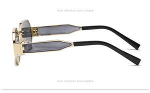 Side view of trendy sunglasses with gold metal frames and bicolored temples