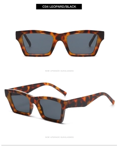 Detail of leopard print rectangular sunglasses with dark grey lenses and NEW UPGRADE text