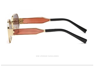 Side view of trendy small frame sunglasses featuring bicolored geometric orange and black legs