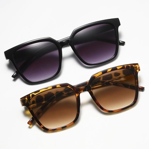 Vintage oversized square sunglasses in black and tortoiseshell finish for women
