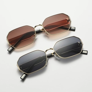 Chic small frame octagonal sunglasses with gold metal frames and wide temples