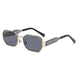 Chic gold metal sunglasses with dark gray octagonal lenses and stylish geometric temples