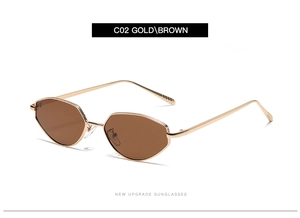 Détails de monture en métal doré et verres bruns sur des lunettes aviateur rétro