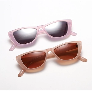Two pack of translucent pink and champagne cat eye sunglasses with tinted lenses