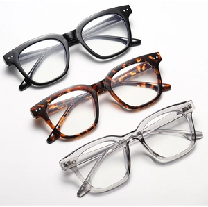Detailed close-up of retro square glasses frames with silver rivets in various colors