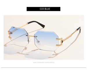 Detail of rimless blue gradient octagonal lenses with textured gold metal temples