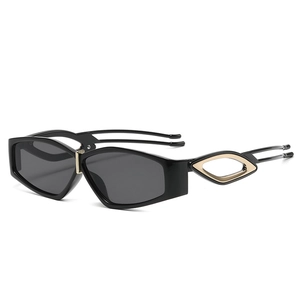 Futuristic geometric sunglasses with black frame and golden industrial metal hinges