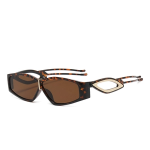 Fashionable tortoise shell sunglasses with gold geometric details and UV400 dark lenses
