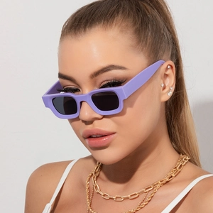 Chic purple thick frame Y2K sunglasses with black lenses on fashion model