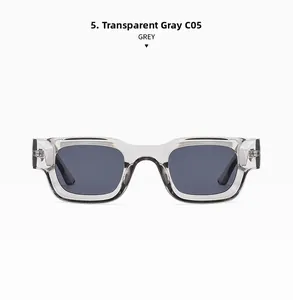 Close-up of transparent grey Y2K rectangular sunglasses with durable metal hinge detail