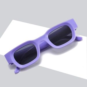 Futuristic purple rectangle sunglasses with thick frame and dark lenses in a 45-degree view