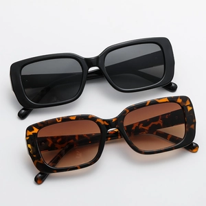 Vintage rectangular sunglasses in classic black and tortoise shell finish for women