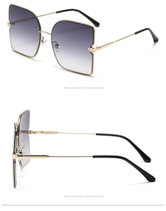 Détails de lunettes de soleil carrées en métal avec verres dégradés et monture dorée