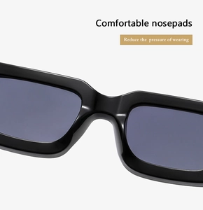 Close-up of integrated comfortable nosepads on stylish thick-frame square sunglasses