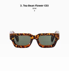 Detail of vintage tortoiseshell thick frame sunglasses with dark green lenses in demi color