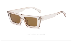 Détails de la monture ovale rose avec verres marrons élégants pour un style streetwear