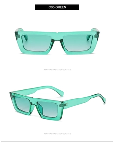 Détails de lunettes de soleil ovales vertes translucides avec rivets et verres dégradés