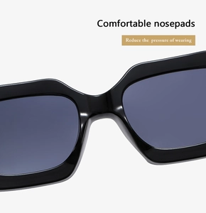 Detail of comfortable integrated nose pads on black square polygon sunglasses for pressure relief