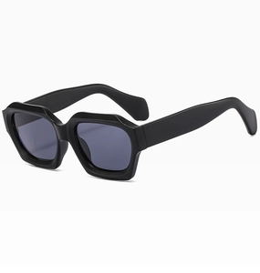 Detail view of bold geometric black frames with dark grey lenses for these retro sunglasses