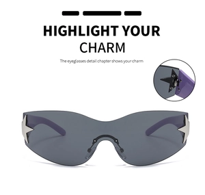 Close-up of star-shaped metal hinge on oversized rimless grey wrap sunglasses