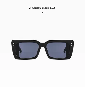Front view of black rectangular sunglasses with silver stud detail and wide temples
