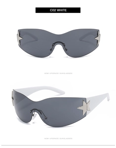 Detail of white star sunglasses featuring gray one-piece lenses and metal star accents