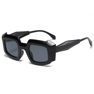 Retro geometric thick frame sunglasses with futuristic polygon cut and black tinted lenses