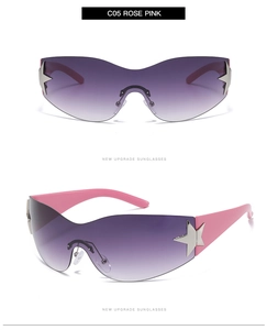 Detail view of pink Y2K star-studded oversized rimless sunglasses with gradient lenses