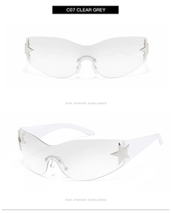 Close-up of clear grey Y2K rimless sunglasses with silver star detail and white temples