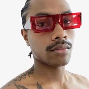 Fashion rectangular sunglasses with red transparent frames for a trendy street look