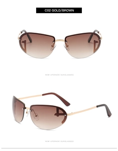 Macro view of gold metal frames and brown gradient lenses with D-shaped cutout design